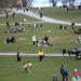 epa08370757 People meet playing ball, having picnics and enjoying the spring weather at the Raslambshovsparken park in Stockholm, Sweden, 18 April 2020. Restrictions seem not that strict in the Scandinavian country while other countries for several weeks have tightened their measures to prevent the widespread of the SARS-CoV-2 coronavirus which causes the COVID-19 disease.  EPA/Fredrik Sandberg SWEDEN OUT