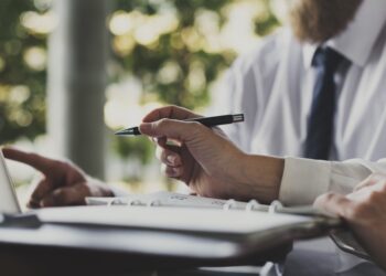 Business people working using a laptop