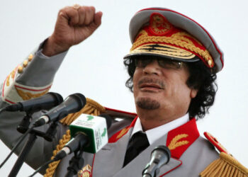 FILE - In this Saturday, June 12, 2010 file photo, Libyan leader Moammar Gadhafi talks during a ceremony to mark the 40th anniversary of the evacuation of the American military bases in the country, in Tripoli, Libya. The Associated Press is aware of reports that Moammar Gadhafi has been captured in Sirte. The chief spokesman for the revolutionary National Transitional Council Jalal el-Gallal and the council military spokesman Abdul-Rahman Busin told the AP that those reports are unconfirmed. (AP Photo/ Abdel Magid Al Fergany, File)